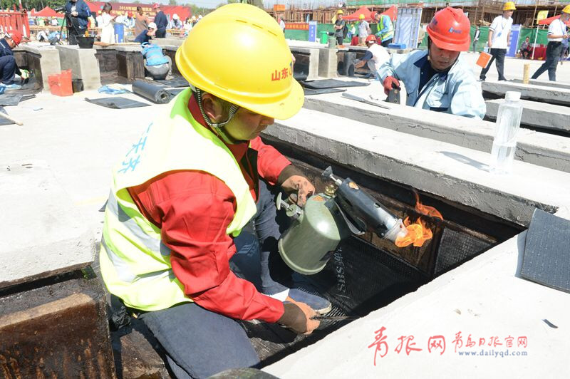 比速度拼質(zhì)量！青島農(nóng)民工建筑技能大比拼(圖2)